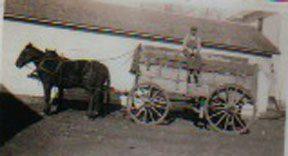 Ed Helm on wagon 1924