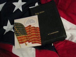 Howard McCracken's Bible with card and flag from his Memorial